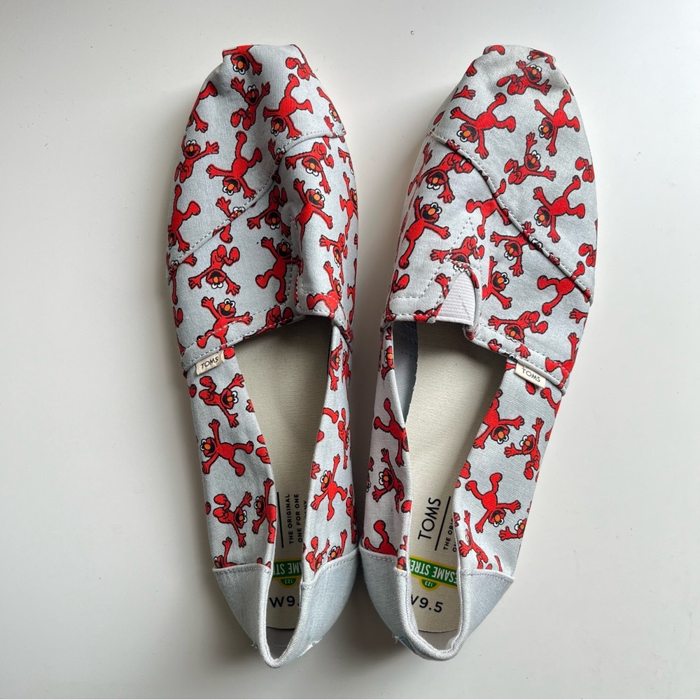 NWOT Toms x Sesame Street Light Blue Elmo Print Alpargata Slip Ons - W9.5